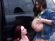 A woman sucks a pair of lactating breasts A woman sucks a pair of lactating breasts